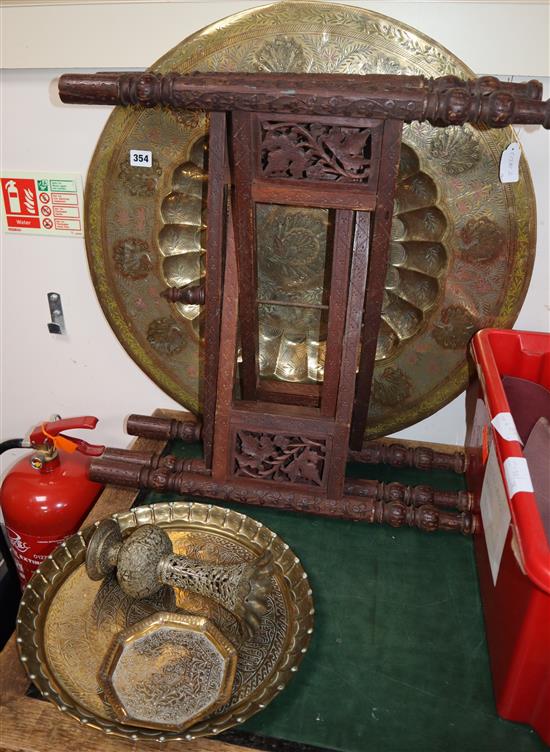 A Benares brass top table, a dish, a vase and a tray